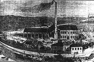 Eine Schwarz-Weiß-Zeichnung einer Fabrik inmitten eines Feldes mit Gebäuden, Bäumen und einem Mast im Vordergrund und einem Text am unteren Rand, der "The New York State Penitentiary" lautet.